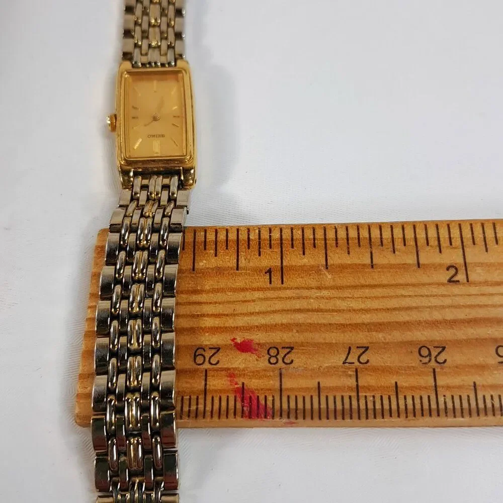 Vintage Seiko Watch Women Gold Tone Gold Dial Rectangle bracelet 2E20-7023 dress